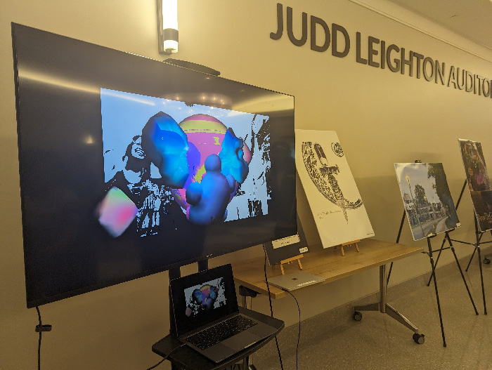 image of the art piece Weird Land being shown in a public space.